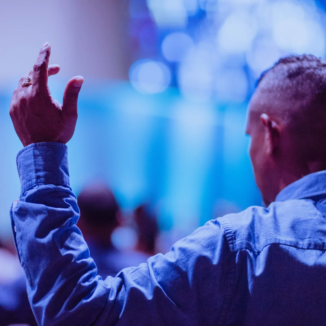 A moment of prayer during a service at Living Destiny Church in Norfolk
